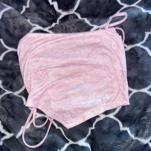 light pink bandana shaped top.